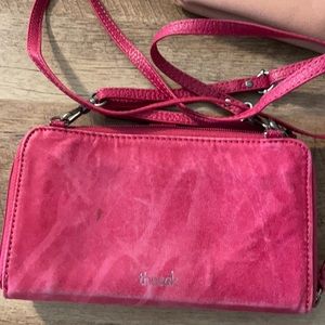TheSak Crossbody wallet. Has lots of room for cash and cards.